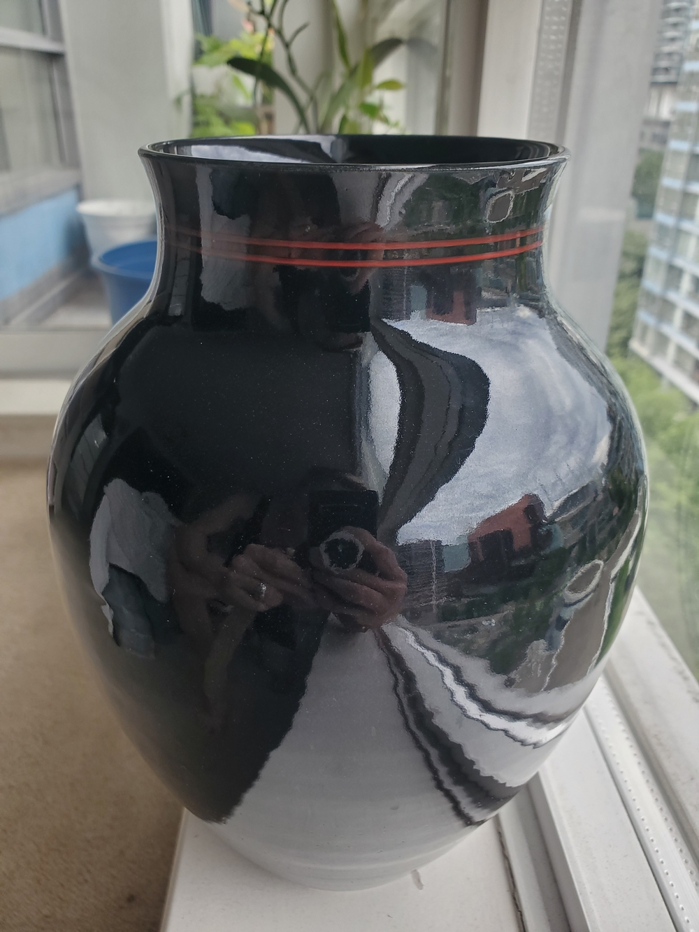Glossy Black Ceramic Vase with Thin Red Accent
